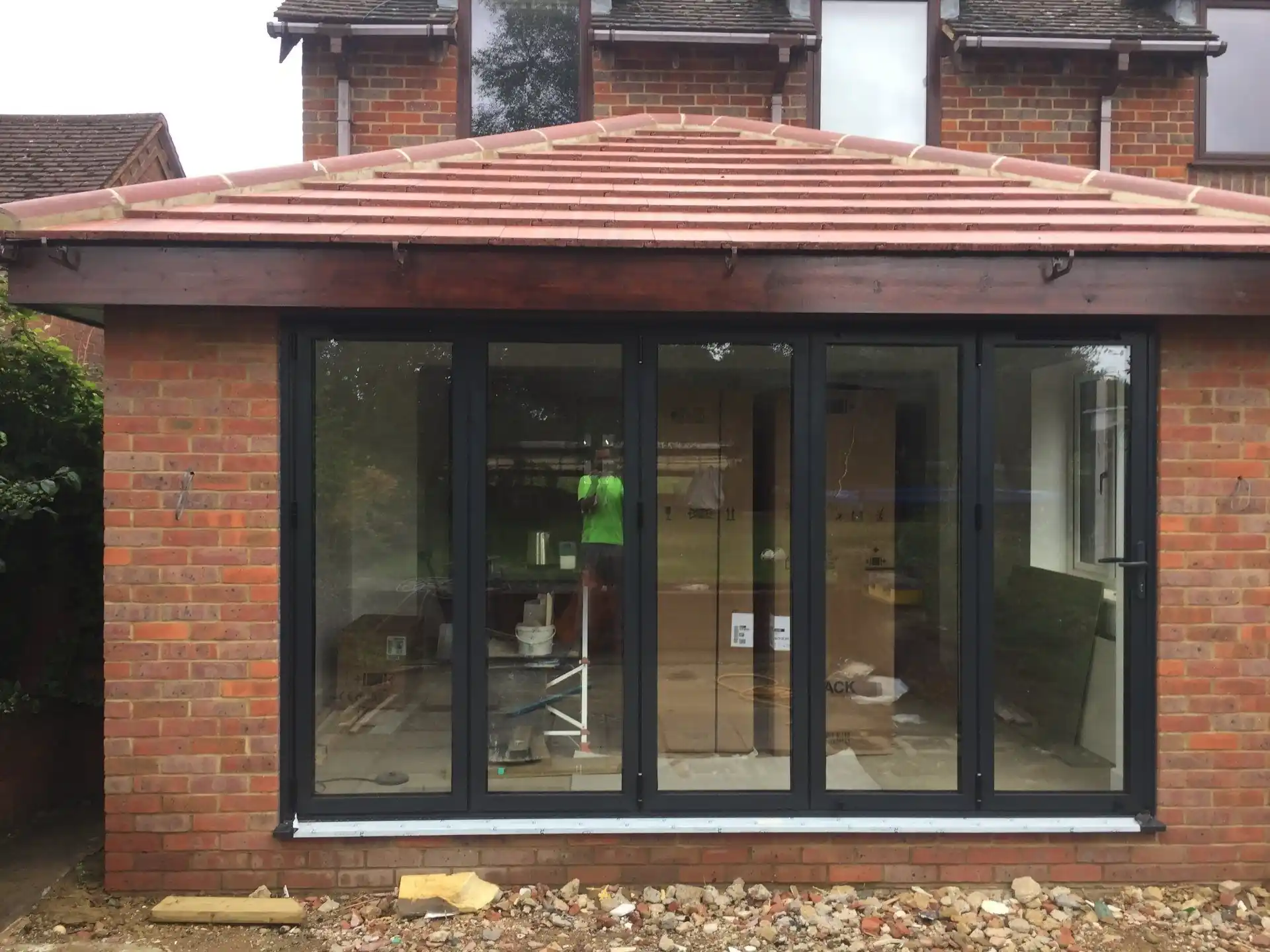 Brick rear extension with black aluminium bifold doors — AVA Building, Truro Cornwall