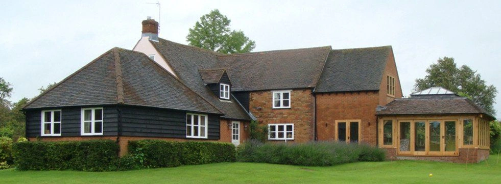 Brick and timber home extension with glazed garden room — AVA Building, Truro Cornwall
