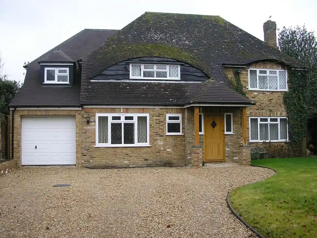 Detached brick house with gravel driveway — AVA Building & Construction, Truro Cornwall
